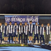 Senior night team picture. We printed the banner and stoles that the students are shown wearing